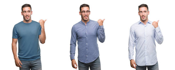 istock Handsome young man wearing different outfits smiling with happy face looking and pointing to the side with thumb up. 1044263484