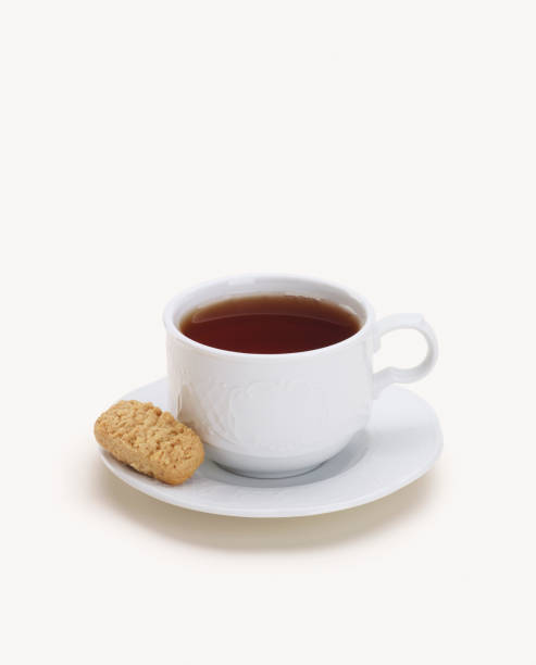 istock Cup of tea with a cookie biscuit 1044263570