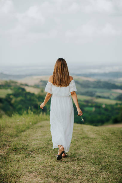istock Young  woman relaxing outside in nature 1044266384