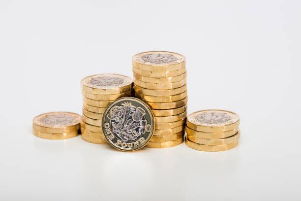 istock Pile of Pound coins 1044266534