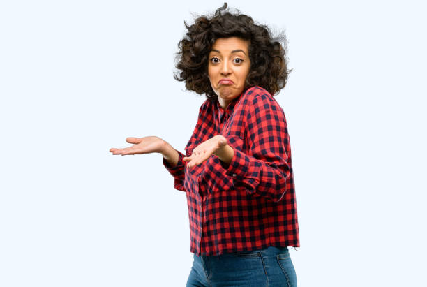 istock Beautiful arab woman doubt expression, confuse and wonder concept, uncertain future 1044266746