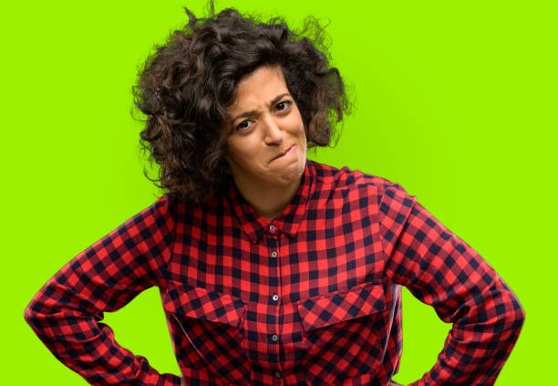 istock Beautiful arab woman doubt expression, confuse and wonder concept, uncertain future 1044266922