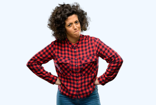 istock Beautiful arab woman doubt expression, confuse and wonder concept, uncertain future 1044266970
