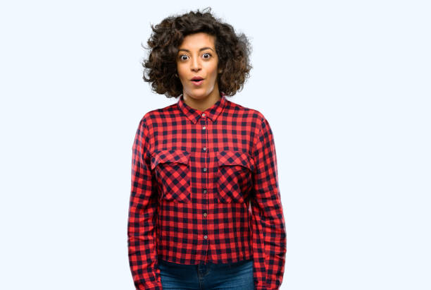 istock Beautiful arab woman happy and surprised cheering expressing wow gesture 1044267052