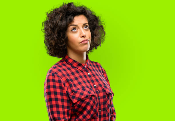 istock Beautiful arab woman doubt expression, confuse and wonder concept, uncertain future 1044267382