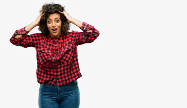 istock Beautiful arab woman happy and surprised cheering expressing wow gesture 1044267410