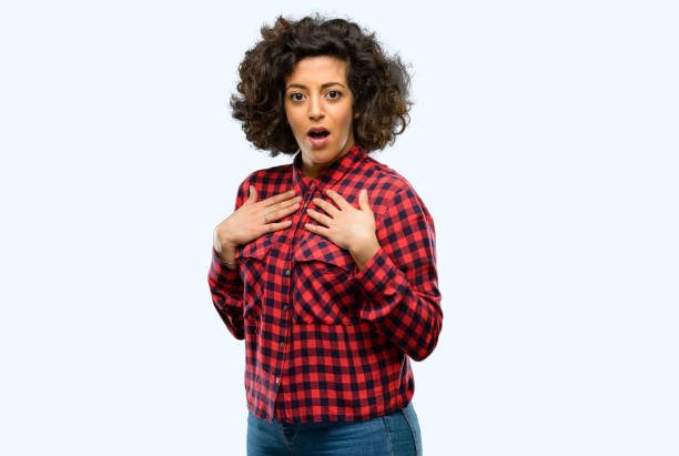 istock Beautiful arab woman happy and surprised cheering expressing wow gesture 1044267420