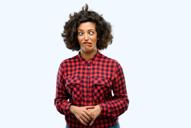 istock Beautiful arab woman making funny face fooling 1044267566
