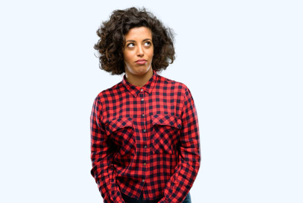 istock Beautiful arab woman making funny face fooling 1044267592