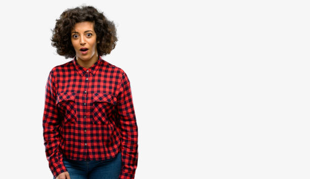 istock Beautiful arab woman scared and surprised cheering expressing wow gesture. Unbelieving 1044267970
