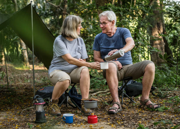 istock Friends having coffee at a campsite 1044271066