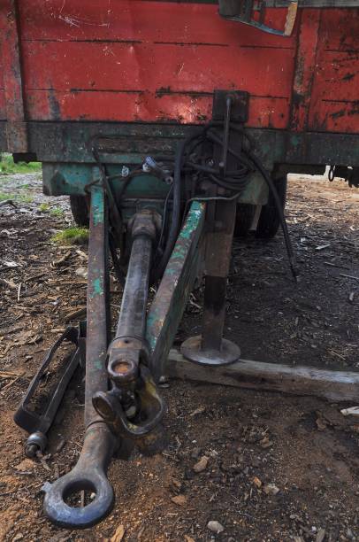 istock Old red trailer for transporting logs detail. 1044271476