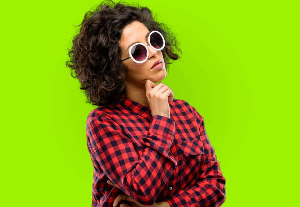 istock Beautiful arab woman thinking thoughtful with smart face 1044271632