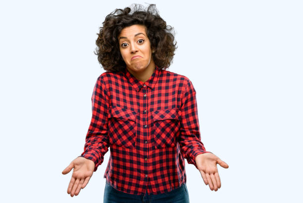 istock Beautiful arab woman doubt expression, confuse and wonder concept, uncertain future 1044271762
