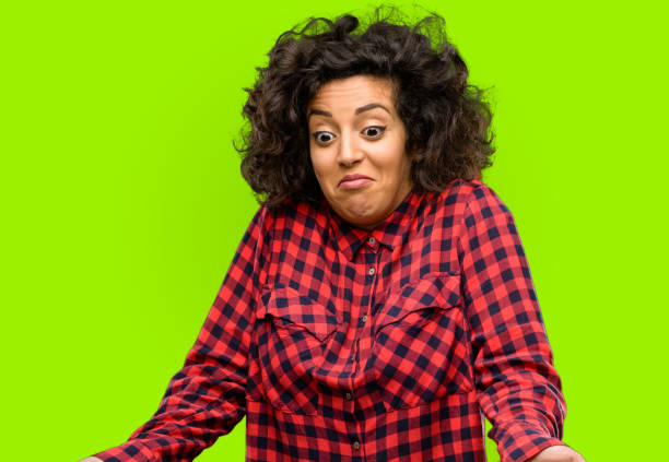 istock Beautiful arab woman doubt expression, confuse and wonder concept, uncertain future 1044271764