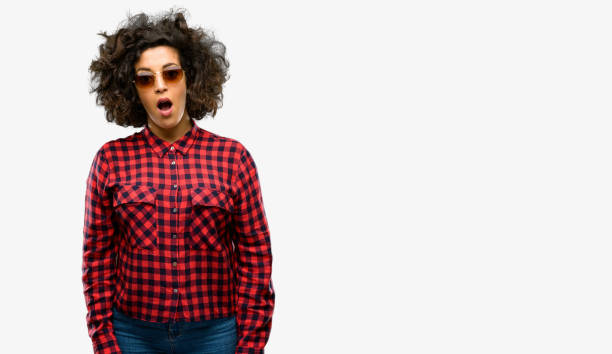 istock Beautiful arab woman happy and surprised cheering expressing wow gesture 1044271790