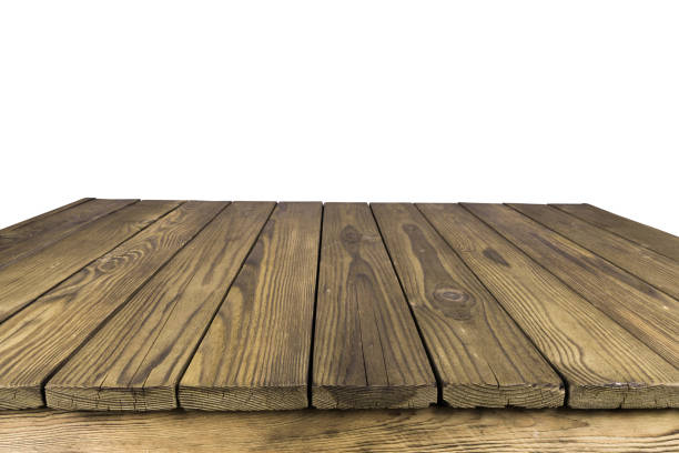 istock Wooden table isolated on a white background. Selective focus. 1044275620