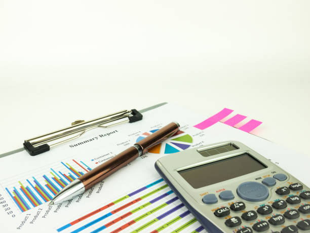 istock Marketing report chart and Financial graph analysis with pen and calculator. 1044275952