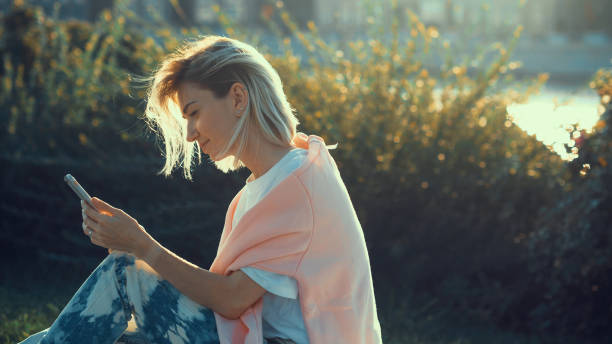 istock Young girl with a phone 1044277048