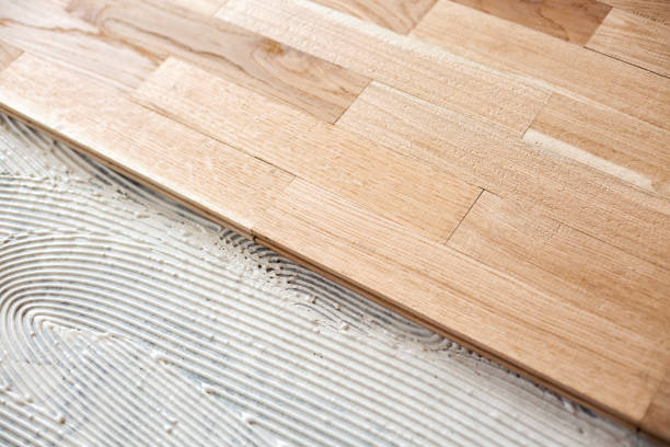 istock Covering of a floor with parquet 1044280068
