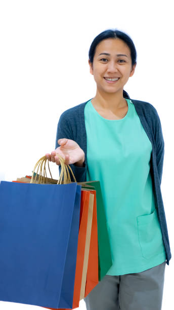 istock Women holding bag shopping on white background 1044280814