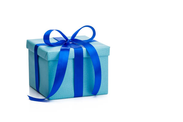 Blue gift boxes with blue ribbon. Copy-space and shallow DOF.