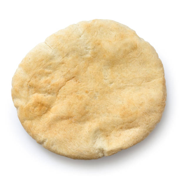 istock Plain pita bread isolated on white from above. 1044284294