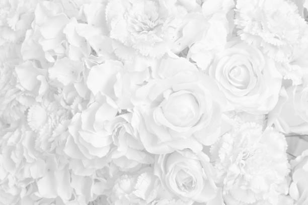 istock Beautiful white decoration artificial rose flower 1044292144