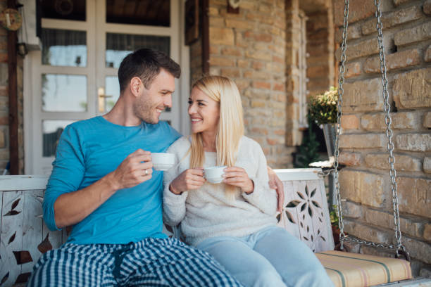 istock Young couple having a cup of tea 1044292666