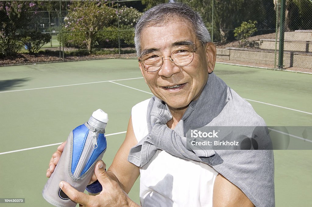 Asiatiche sorridente Senior - Foto stock royalty-free di Abbigliamento sportivo