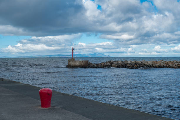 istock Girvan Harbour & Seawall Scotland 1044307558