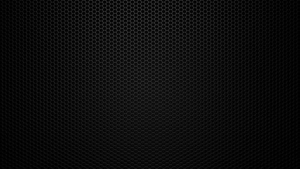 istock Black stainless steel hexagonal mesh background. 1044315654