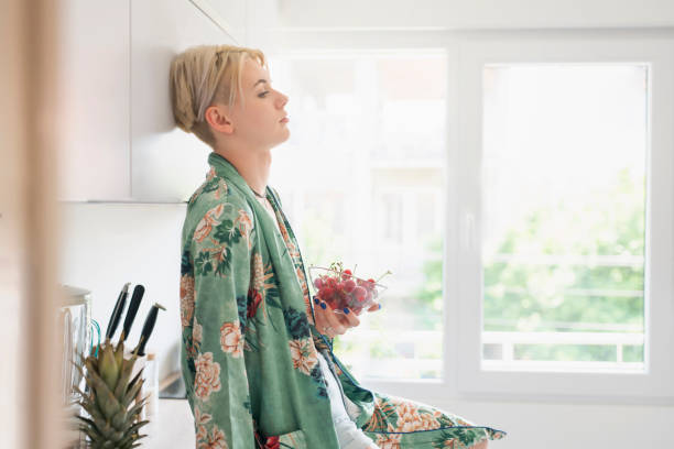 istock Woman with sweet cherries 1044315956