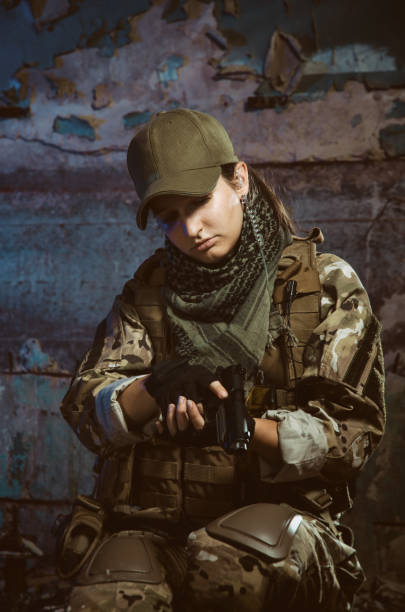 istock the people in uniform with weapons in the ruins 1044316190