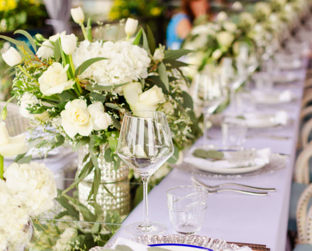 istock Set table for a white and aqua blue wedding dinner decorated 1044316220