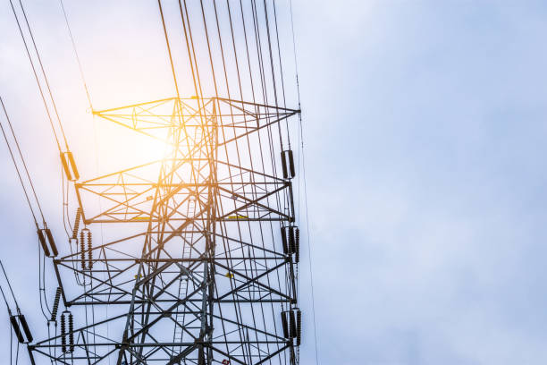 istock Electricity concept. Close up high voltage power lines station. 1044319390
