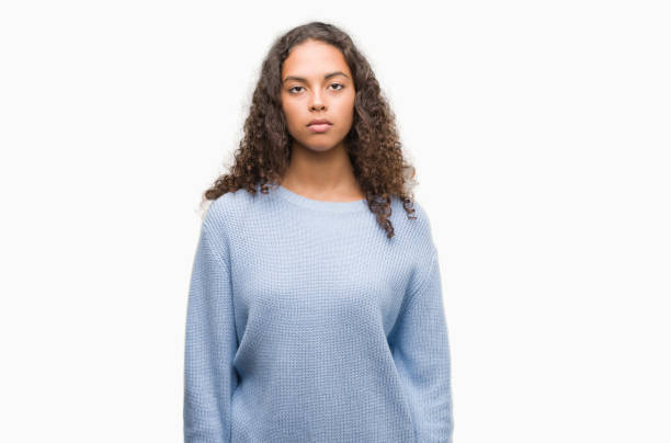 istock Beautiful young hispanic woman with a confident expression on smart face thinking serious 1044319422