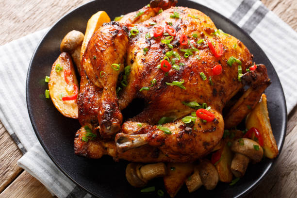 istock grilled chicken with fried mushrooms and potatoes close-up. horizontal 1044323660