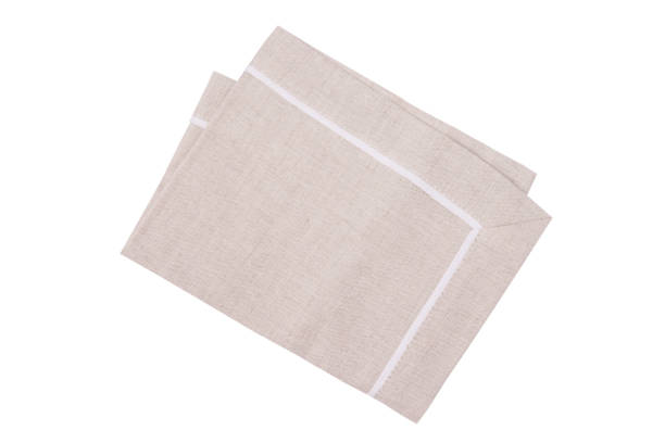 istock Beige napkin in cage isolated on white background 1044327186