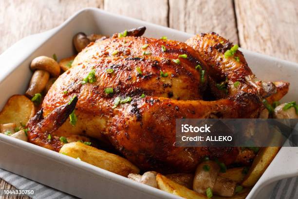 Grilled Chicken With Mushrooms And Potatoes Closeup In A Baking Dish Horizontal Stock Photo - Download Image Now