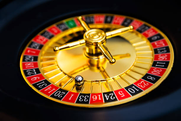 istock Casino playing roulette on green table 1044331368