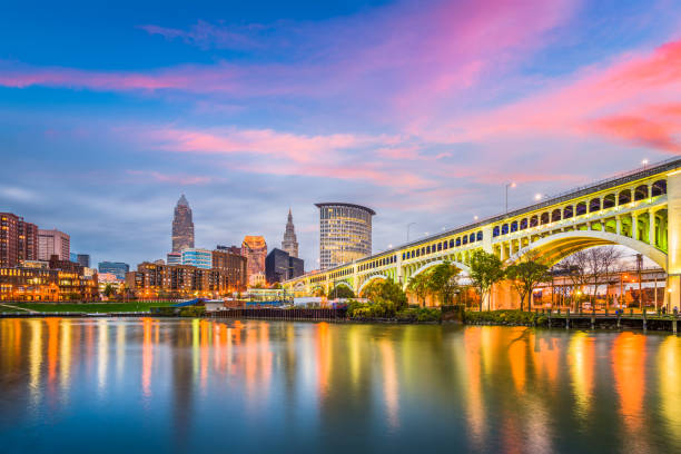 Cleveland, Ohio, USA downtown city skyline on the Cuyahoga River Cleveland, Ohio, USA downtown city skyline on the Cuyahoga River at twilight. ohio photos stock pictures, royalty-free photos & images