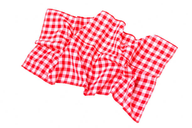 istock Red tablecloth in a cage isolated on a white background 1044335668