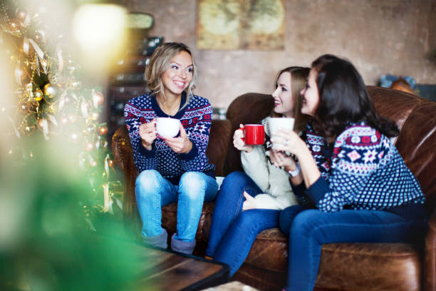 istock Group of people celebrating Christmas 1044338938
