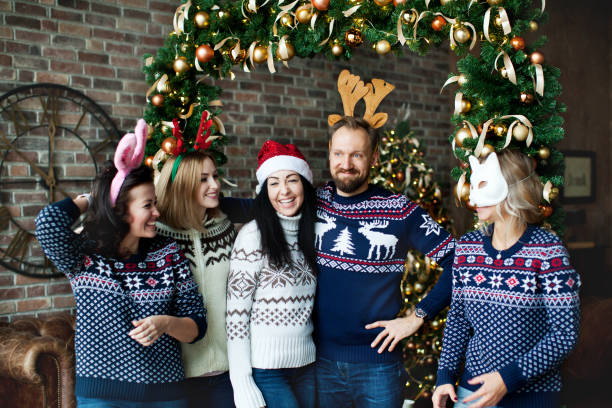 istock Friends celebrating Christmas at home 1044339078
