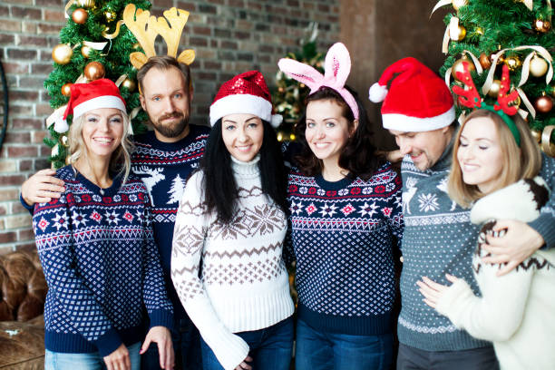 istock Friends celebrating Christmas at home 1044339186