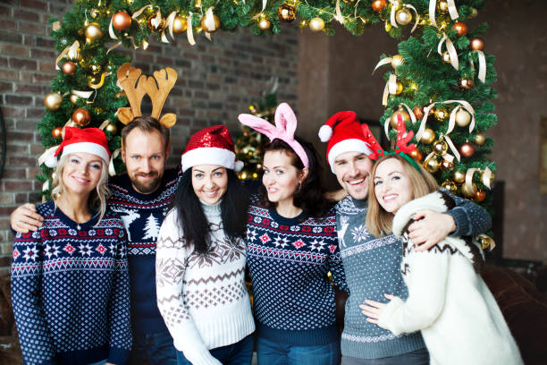 istock Friends celebrating Christmas at home 1044339214