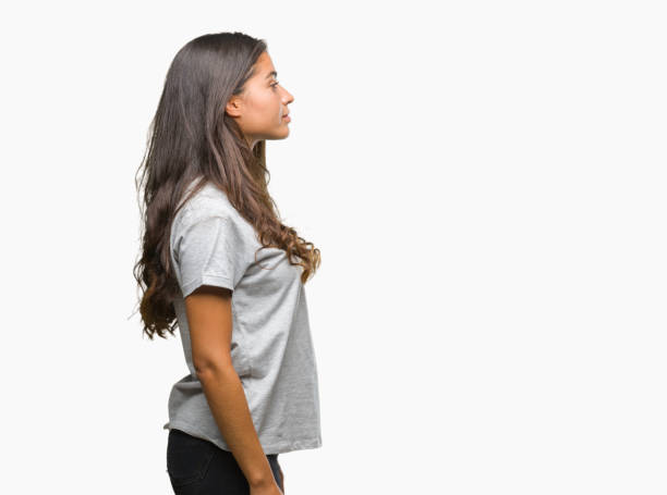 istock Young beautiful arab woman over isolated background looking to side, relax profile pose with natural face with confident smile. 1044346874