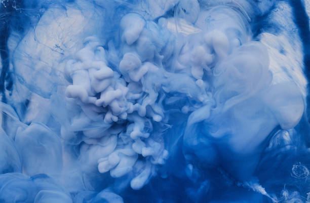 istock Acrylic color paints are in the water 1044347812