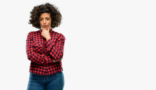 istock Beautiful arab woman thinking thoughtful with smart face 1044357534